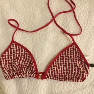 Red and white polka dot bikini top with gold ring